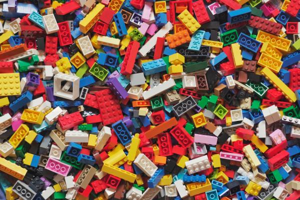 Table top filled with colorful LEGO bricks