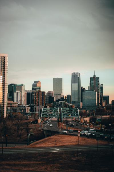An image of the Denver skyline centered on the Speer Boulevard Bridge.
