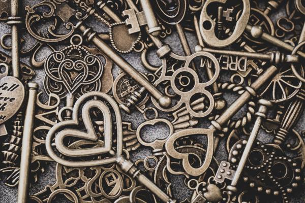 image of a pile of metal keys, most with heart-shaped handles