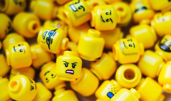 a pile of LEGO heads