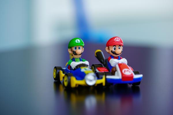 Two mario kart racers on a table