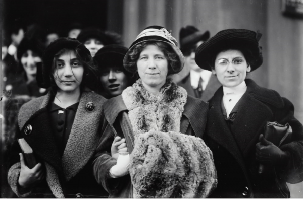group of women with hats and coats
